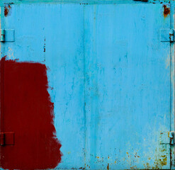 Metal garage doors painted by people as an abstract painting