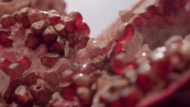 Pomegranate close-up. Wiring slider. garnet is sprinkled with gold dust. kandurin