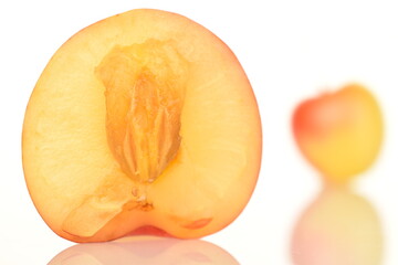 Yellow sweet cherry, close-up, on a white background.
