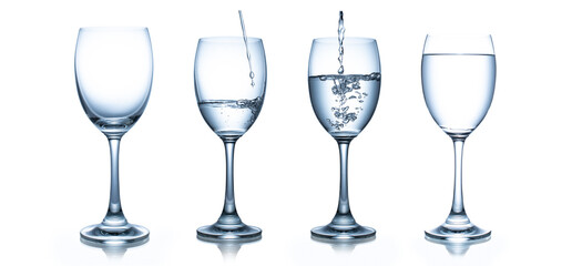 Empty wine glass. Isolated on white background. Water pouring in glass. This has clipping path.