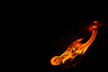 Flame fire on black background, burning and blazing flame.  Copy space for your text