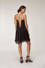 Beautiful woman fashion model makeup brunette hair perfect body shape tanned skin wear clothes...