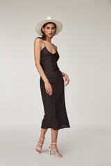 Beautiful woman fashion model makeup brunette hair perfect body shape tanned skin wear clothes...