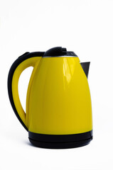 Yellow plastic electric kettle close up
