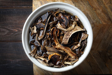 Traditional Siberian food: sundried forest mushrooms soaked before cooking