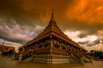 Fototapeta premium Background of the major tourist attractions in Khon Kaen (Phra Mahathat Kaen Nakhon) is a large pagoda with 9 floors, Thai tourists and foreigners come to see the beauty and travel in Thailand always.