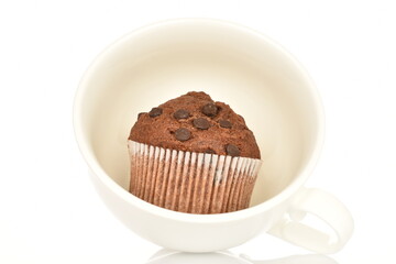 Chocolate muffins, close-up, isolated on a white background.