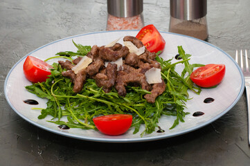 Grilled meat arugula, cheese, tomato sauce and spices