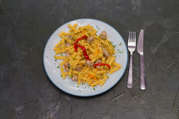 Italian pasta with meat, cheese, spices, parsley and red tomato sauce. Gourmet traditional food