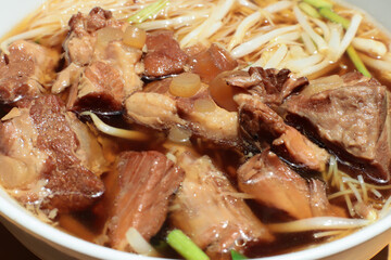 Braised pork noodle on white cup