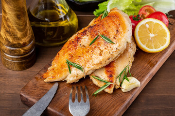 Delicious fried chicken breast and vegetable salad