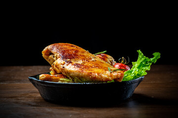 Delicious fried chicken breast and vegetable salad