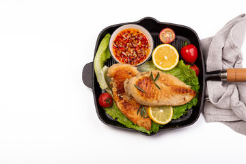 Delicious fried chicken breast and vegetable salad