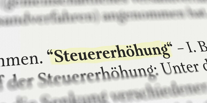 Steuererh&ouml;hung im Buch mit Textmarker