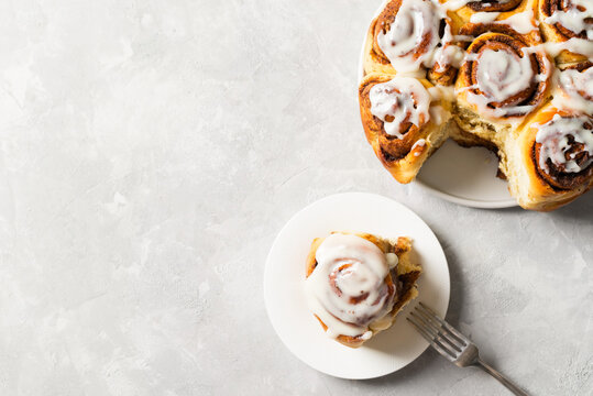 Cinnamon Buns Or Rolls Close Up On White Background