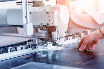 Fabric industry production line. Textile factory. Working tailoring process