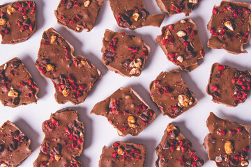 broken pieces of chocolate with nuts