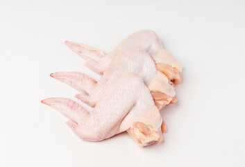 Fresh chicken wings on white background