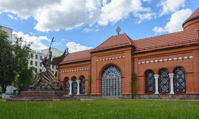 Fototapeta na wymiar Red Church in Minsk. Catholic church of St. Simeon and St. Helena. Belarus.