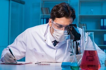 Chemistry assistant working in the chemical lab