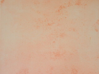 Background with orange terracotta slab on the wall, closeup and copy space