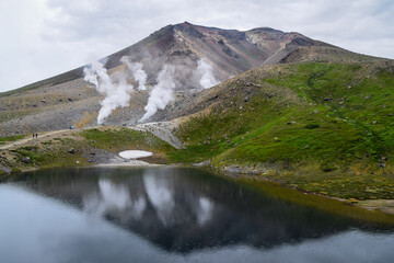 Mount Asahi landscape during summer season, view from Sugatami pond in Daisetsuzan National Park, Hokkaido, Japan.
