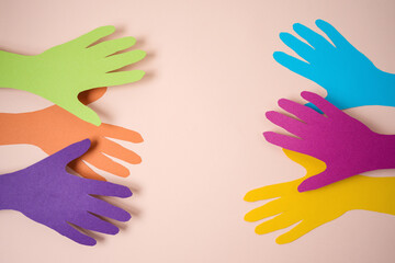 Support diverse community concept with paper hands