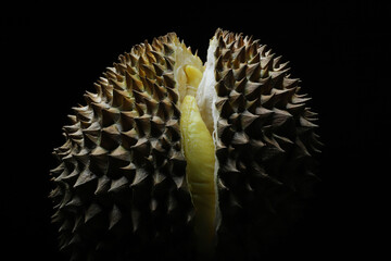 durian fruit that is already split and ready to enjoy