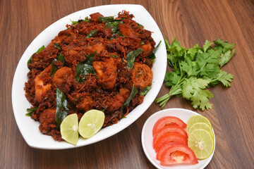 Fried chicken Kebab, Kerala Chicken fry or 65 is hot and spicy crispy chicken dish South India. Non vegetarian starter or quick snack. A popular authentic roasted dish deep fried Indian spices.