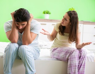 Woman and man in the bedroom during conflict