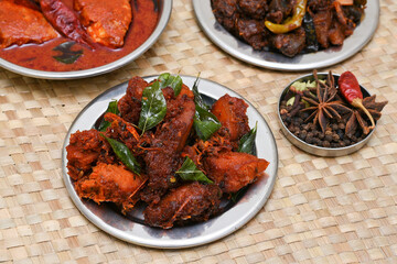 Fried chicken Kebab, Kerala Chicken fry or 65 is hot and spicy crispy chicken dish South India. Non vegetarian starter or quick snack. A popular authentic roasted dish deep fried Indian spices. 