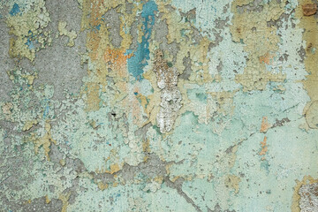 cement wall with colorful dirty cracked texture