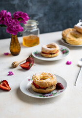 airy custard rings with strawberries for tea