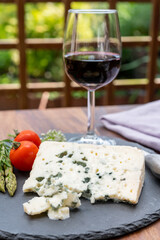 French cheeses collection, piece of roquefort, sheep milk soft blue cheese from Southern France.