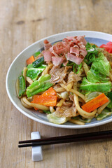 yaki udon , a kind of  japanese udon noodle dish, pan fried udon noodles with meat and vegetables
