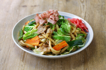 yaki udon , a kind of  japanese udon noodle dish, pan fried udon noodles with meat and vegetables
