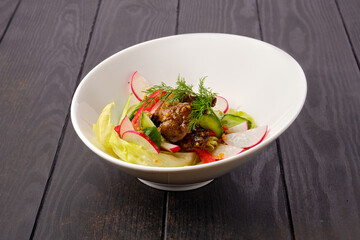 Salad with liver, radish, cucumber, tomato and  creole mustard
