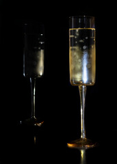 champagne glass on black background