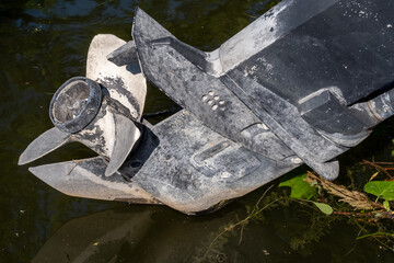 Prop on outboard motor that is lifted out of the water