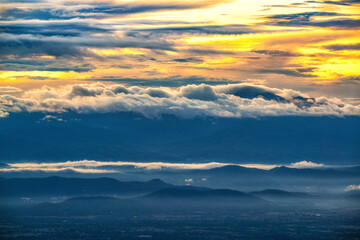 Misty fog and sunlight morning on Doi Suthep mountain important Landmark Travel Place of Chiang Mai, Thailand