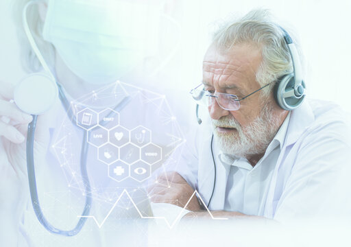 Double Exposure Of Doctor Wearing Headset For Making Online Video Conference