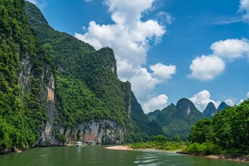 Fotobehang Guilin Tourist boat sailing on a Li River in China  © Pav-Pro Photography 