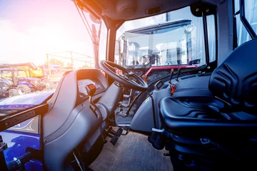 Foto op Plexiglas Modern tractor cabin interior. Agricultural exhibition. Industrial © romaset