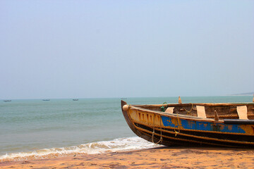 Naklejka premium Empty fishing boat on beach