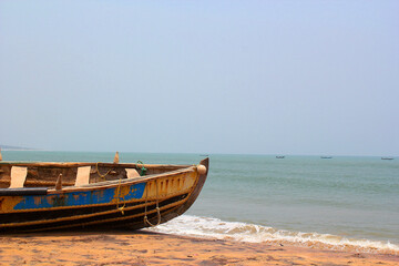 Empty fishing boat on beach