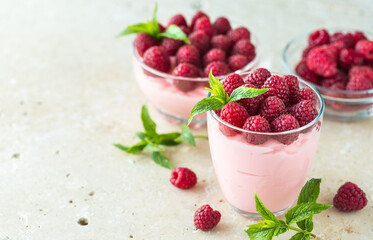 Raspberry dessert in the glass bowl