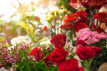 Flower shop with huge arrenge of flowers and lovely roses, floristics concept