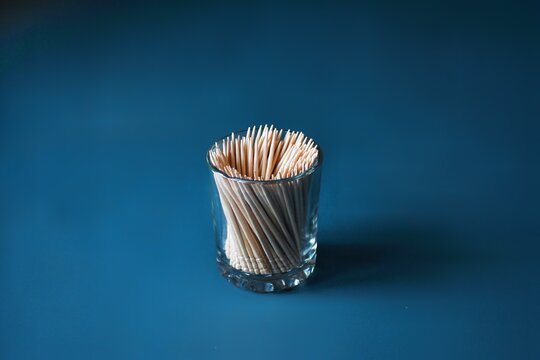 Stack of toothpicks in glass jar
