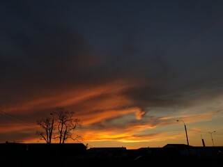 Beautiful view orange sunset in the village