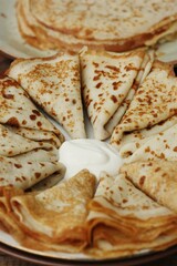 Delicious fresh crepe with sour cream macro